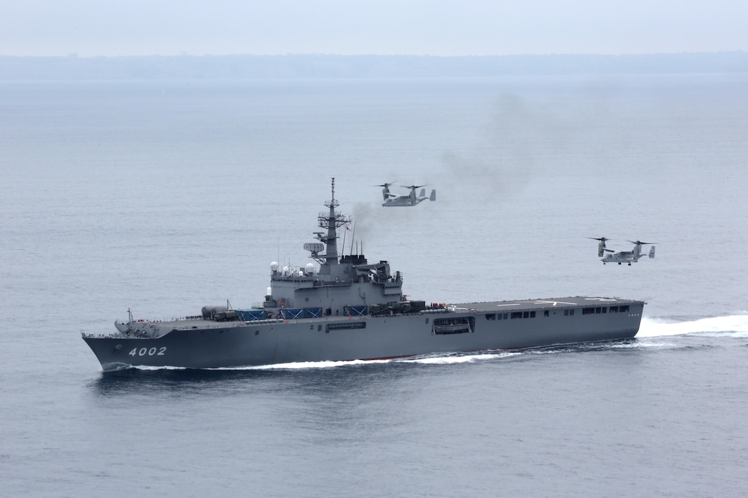 A MV-22B Osprey with Marine Medium Tiltrotor Squadron 161 land aboard the JS Shimokita during Dawn Blitz 2013. Dawn Blitz is part of an annual training exercise that prepares Navy and Marine Corps forces to conduct amphibious operations and offload shipping.