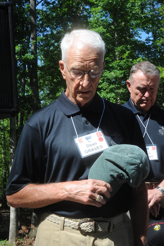 Dean Graves, former Marine officer, bows in prayer at the National Museum of the Marine Corps in Tirangle, Va., on June 15, 2013. Graves participated in a dedication ceremony to honor the Basic Officers Class 3-57.