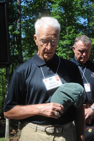 Dean Graves, former Marine officer, bows in prayer at the National Museum of the Marine Corps in Tirangle, Va., on June 15, 2013. Graves participated in a dedication ceremony to honor the Basic Officers Class 3-57.