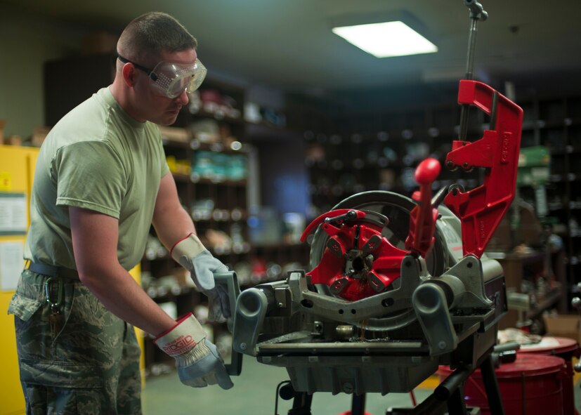 Staff Sgt. Christopher Lee Anderson, 51st Civil Engineer Squadron water and fuels maintenance craftsman, threads a galvanized pipe at Osan Air Base, Republic of Korea, June 7, 2013. Anderson is this week’s Airman Spotlight winner. (U.S. Air Force photo/Senior Airman Siuta B. Ika)