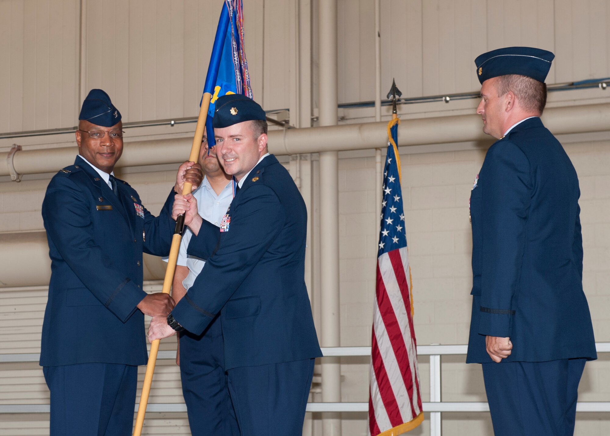 Major Anthony Vieira, 49th Maintenance Squadron incoming commander, assumes command of the 49th Maintenance Squadron during a change of command ceremony at Holloman Air Force Base, N.M., June 14. Vieira recently served as the deputy chief inspector general at Joint Base Pearl Harbor, Hickam, Hawaii. (U.S. Air Force photo by Airman 1st Class Daniel E. Liddicoet/Released)