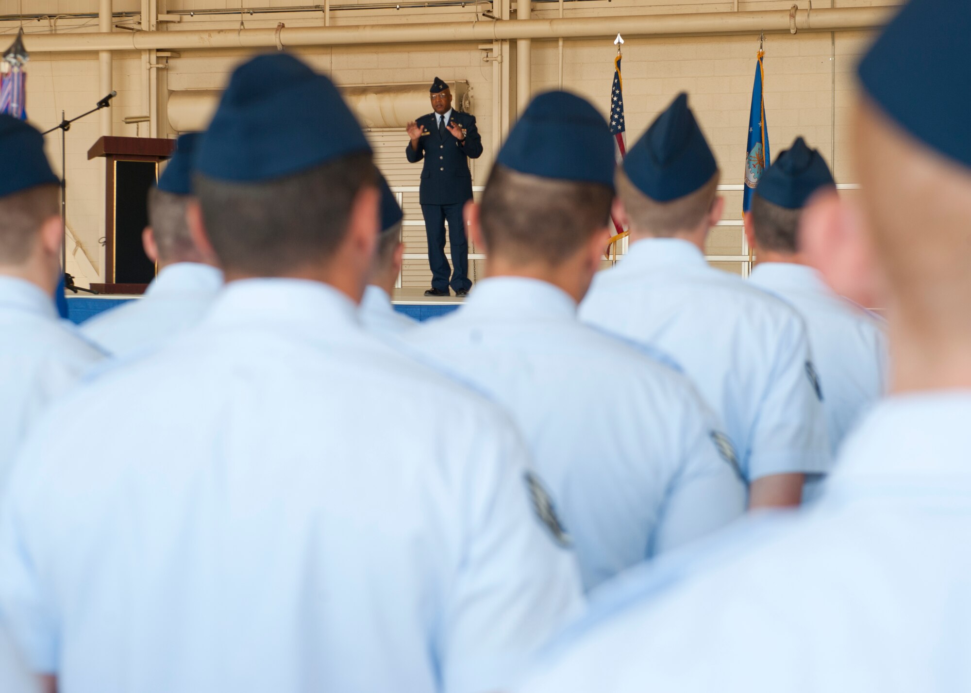 Colonel Andre Kennedy, 49th Maintenance Group commander, provides an introduction speech during a change of command ceremony at Holloman Air Force Base, N.M., June 14. Kennedy manages, plans, programs and implements policies and procedures that affect 1,400 maintenance personnel in four squadrons. (U.S. Air Force photo by Airman 1st Class Daniel E. Liddicoet/Released)