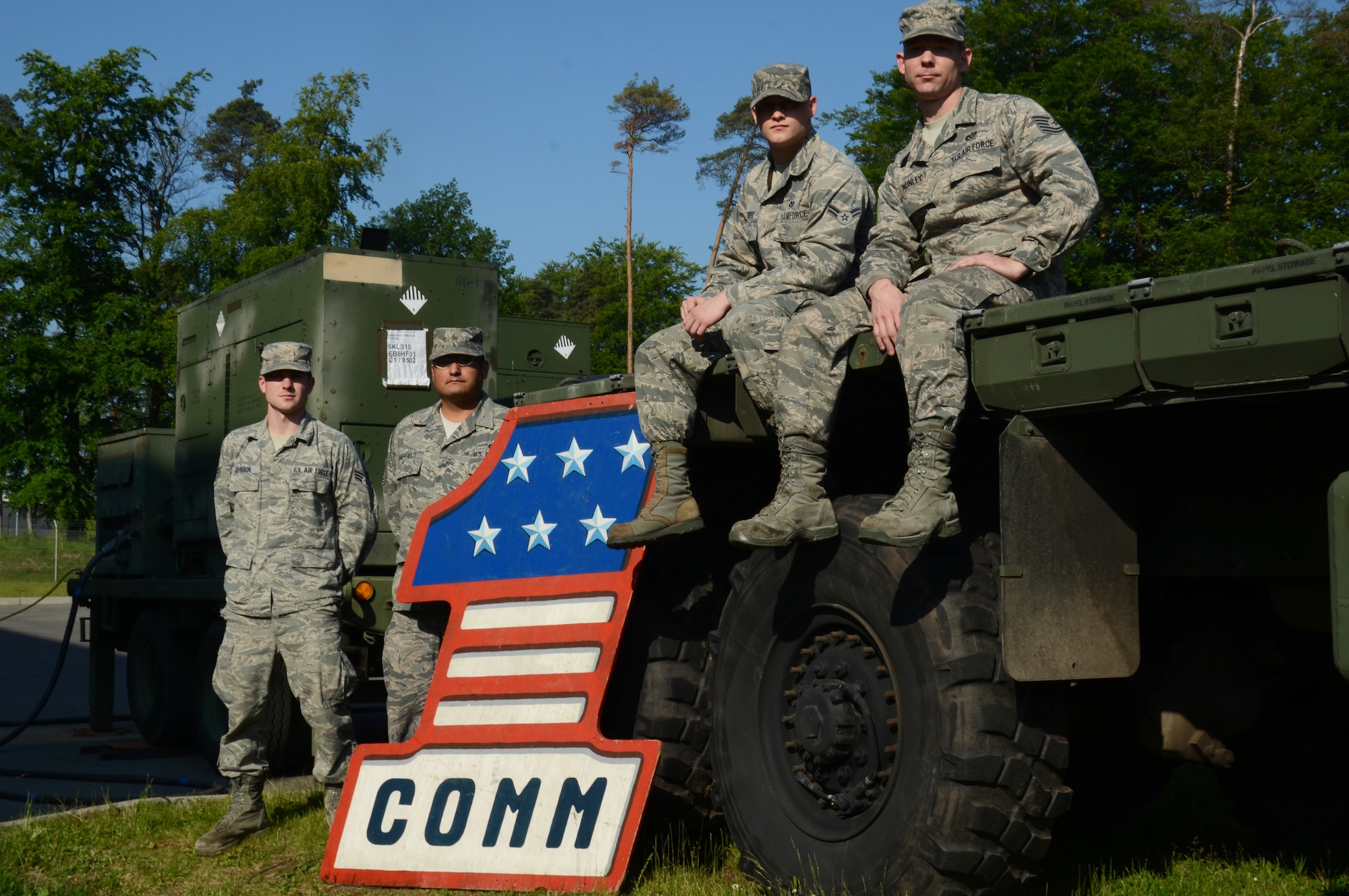 Members of the 1st Combat Communications Squadron technician pose for a photo June 8, 2013, Ramstein Air Base, Germany. The 1st CBCS supported the 603rd AOC with 24-hour manning from June 6 through 8 providing uninterrupted communications with operations in Europe and Africa. (U.S. Air Force photo / 1st Lt. Kay M. Nissen)