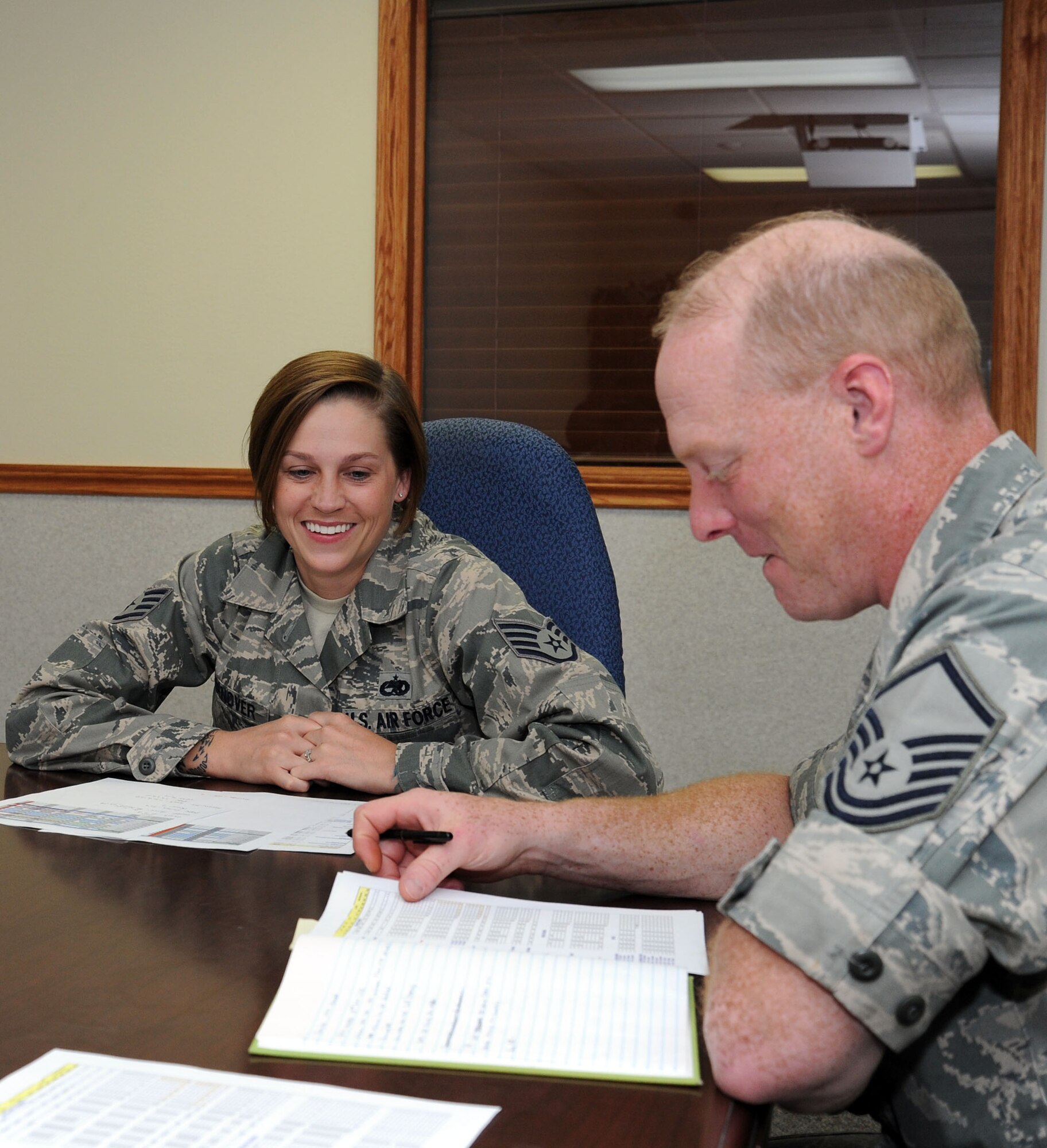 Staff Sgt. Callie Hanover, 92nd Maintenance Operations Squadron maintenance group scheduler, discusses upcoming activities during their monthly scheduling meeting at Fairchild Air Force Base, Wash., June 17, 2013. Hanover has been selected as a member of Fairchild’s Finest. (U.S. Air Force photo by Airman 1st Class Janelle Patiño/Released)