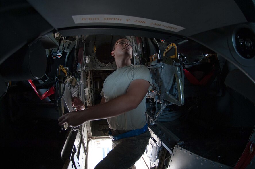 U.S. Air Force Senior Airman Angel Ramirez, 7th Aircraft Maintenance Squadron, performs a pre-flight check of a B-1 Bomber June 11, 2013, at Dyess Air Force Base, Texas. From June 10-13, the 9th Bomb Squadron performed a sortie surge, attempting to fly 74 sorties in four days completing 58. The surge was performed to ensure all aircrews and maintainers of the 9th BS are operational wartime qualified for their upcoming deployment. (U.S. Air Force photo by Airman 1st Class Kylsee Wisseman/Released) 
