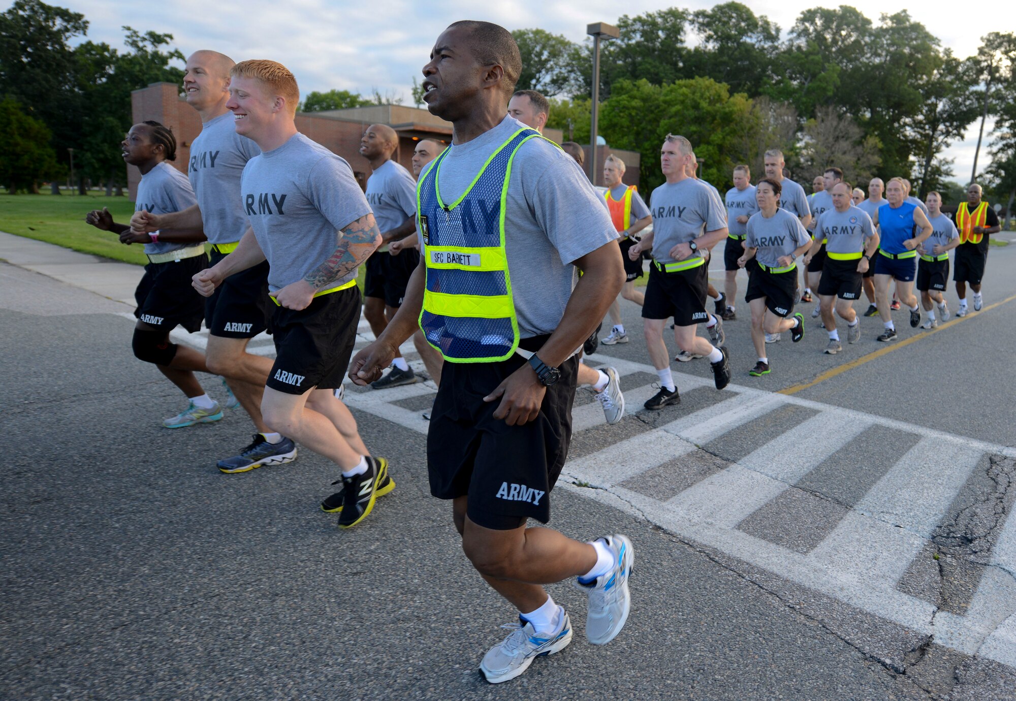 A platoon leader calls out jodies during a four-mile celebratory run for both the Army and Training and Doctrine Command's birthdays, June 14, 2013 at Fort Eustis, Va. The Army turned 238 on June 14, and TRADOC will turn 40 in July. (U.S. Air Force photo by Airman 1st Class Austin Harvill/Released)