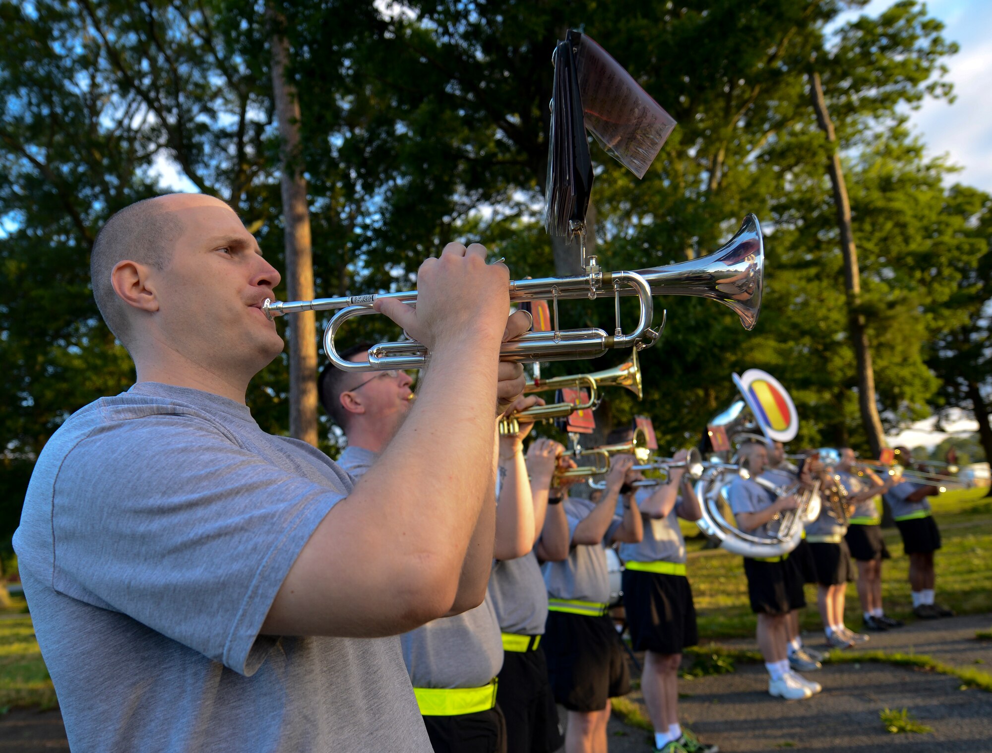 The Training and Doctrine Command Band plays “Gonna Fly Now” as runners begin their four-mile run across Fort Eustis, Va., June 14, 2013, in celebration of both the Army and Training and Doctrine Command's birthdays. After the run, the TRADOC jazz ensemble played background music for the birthday ceremony. (U.S. Air Force photo by Airman 1st Class Austin Harvill/Released)