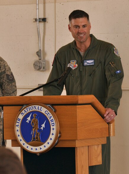 Maj. Adam Langton, new commander of Florida Air National Guard’s 125th Fighter Wing, Detachment 1, addresses the crowd during a change of command ceremony at Homestead Air Reserve Base, Fla., June 14. Langton, previously the Director of Operations for Detachment 1, replaces Lt. Col. James Spooner, who has been the Detachment 1 commander for the last 31 months. (U.S. Air Force photo/Senior Airman Jaimi Upthegrove)