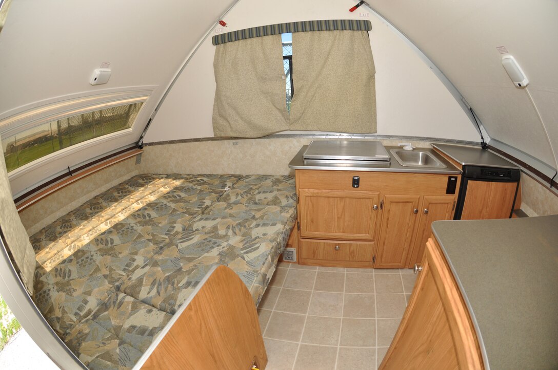 A small yet functional camper provides a more comfortable retreat to nature. The Outdoor Recreation program at the Niagara Falls Air Reserve Station offers a variety of equpiment to rent for various summertime activities. (U.S. Air Force photo by Staff Sgt. Stephanie Clark) 