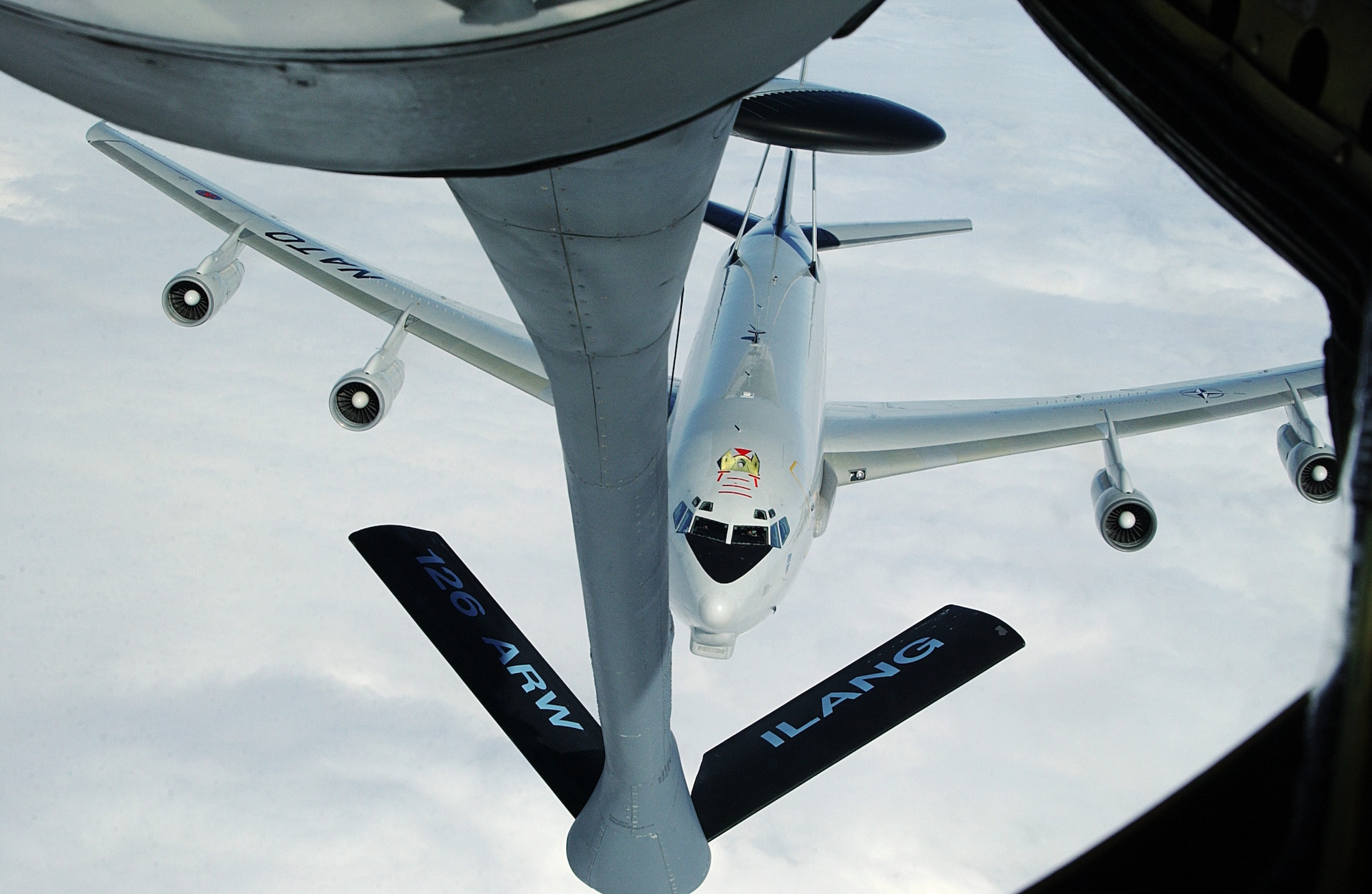 A NATO E-3A AWACS approaches a 126th Air Refueling Wing’s KC-135E Stratotanker during an aerial refueling rendevous over Europe, June 28, 2007. (National Guard photo by Tech. Sgt. Mike Rice)