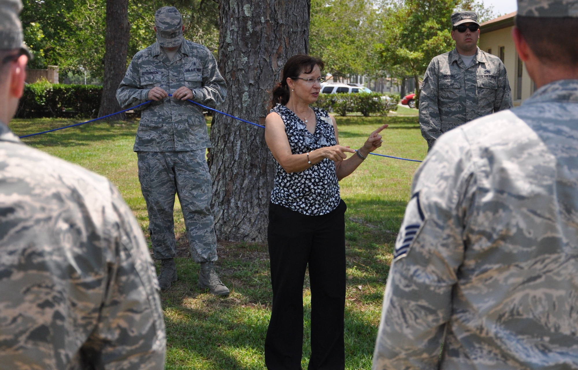 Jodie Schwartz, Airman and Family Readiness Center chief and Master Resilience Trainer, directs Tyndall’s newest RTAs resiliency activities during a two day course at the Airman and Family Readiness Center June 12 and 13. The course was designed to teach them how to provide resiliency training within their individual squadrons. During their two days of training, the RTAs were taught, with a mixture of classroom style slideshow lectures and hands-on activities, which the RTA can use in resiliency training they facilitate for their own squadron. (U.S. Air Force photo by Airman 1st Class Alex Echols)
