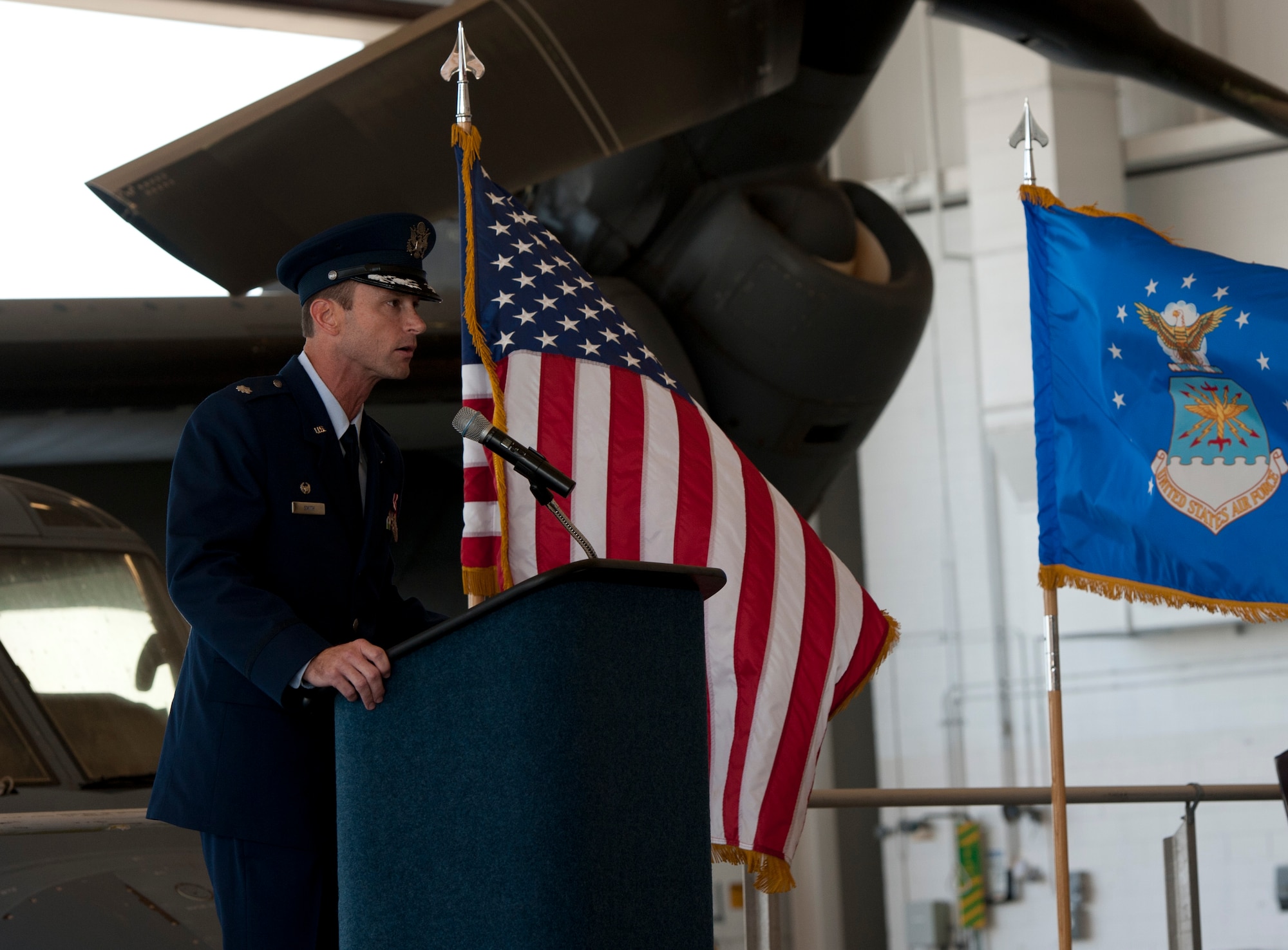 Lieutenant Col. Matt Smith speaks during the 8th Special Operations Squadron change of command ceremony at the Freedom Hangar on Hurlburt Field, Fla. June 14, 2013. Smith relinquished command to Lt. Col. Travis Hill during the ceremony.  (U.S. Air Force photo by Senior Airman Krystal M. Garrett)  