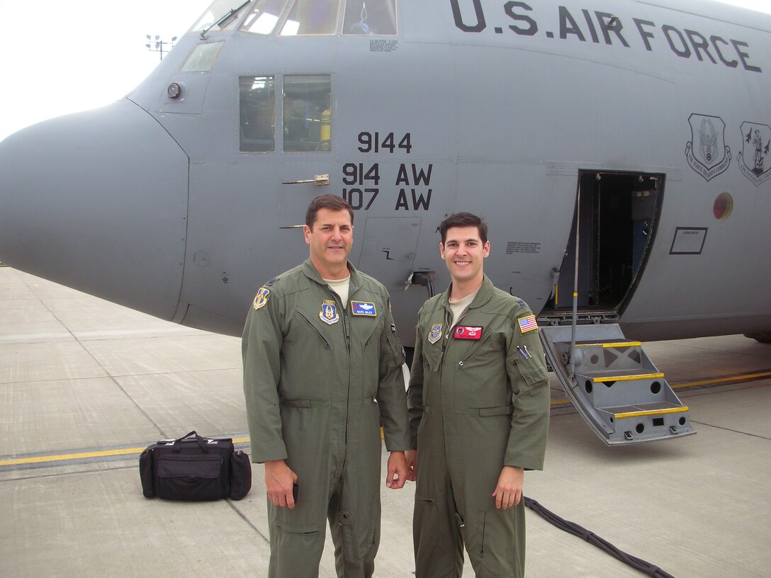 Lt. Col Mark Ables, (left) poses with his son, Capt. Matthew Ables prior to their first flight together as U.S. Air Force Commissioned Officers, June 13, 2013. As the two pilots progressed in their careers, they have flown the same planes at different times, until today. (Courtesy Photo by Lt. Col Mark Ables.)