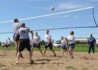 Ellsworth senior leaders compete in a volleyball match against Airman Leadership School class 13-6 students at Ellsworth Air Force Base, S.D., June 4, 2013.  In addition to promoting physical activity, the match allowed Airmen to enhance their teamwork and leadership skills. (U.S. Air Force photo by Airman 1st Class Anania Tekurio/ Released)