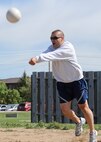 Lt. Col. David Burnett, 28th Force Support Squadron commander, returns a serve during an Airman Leadership School volleyball match at Ellsworth Air Force Base, S.D., June 4, 2013. ALS students competed against commanders, chiefs and first sergeants in the best of a three game set as part of the activity designed to promote healthy competition and wingman camaraderie. (U.S. Air Force photo by Airman 1st Class Anania Tekurio/Released).