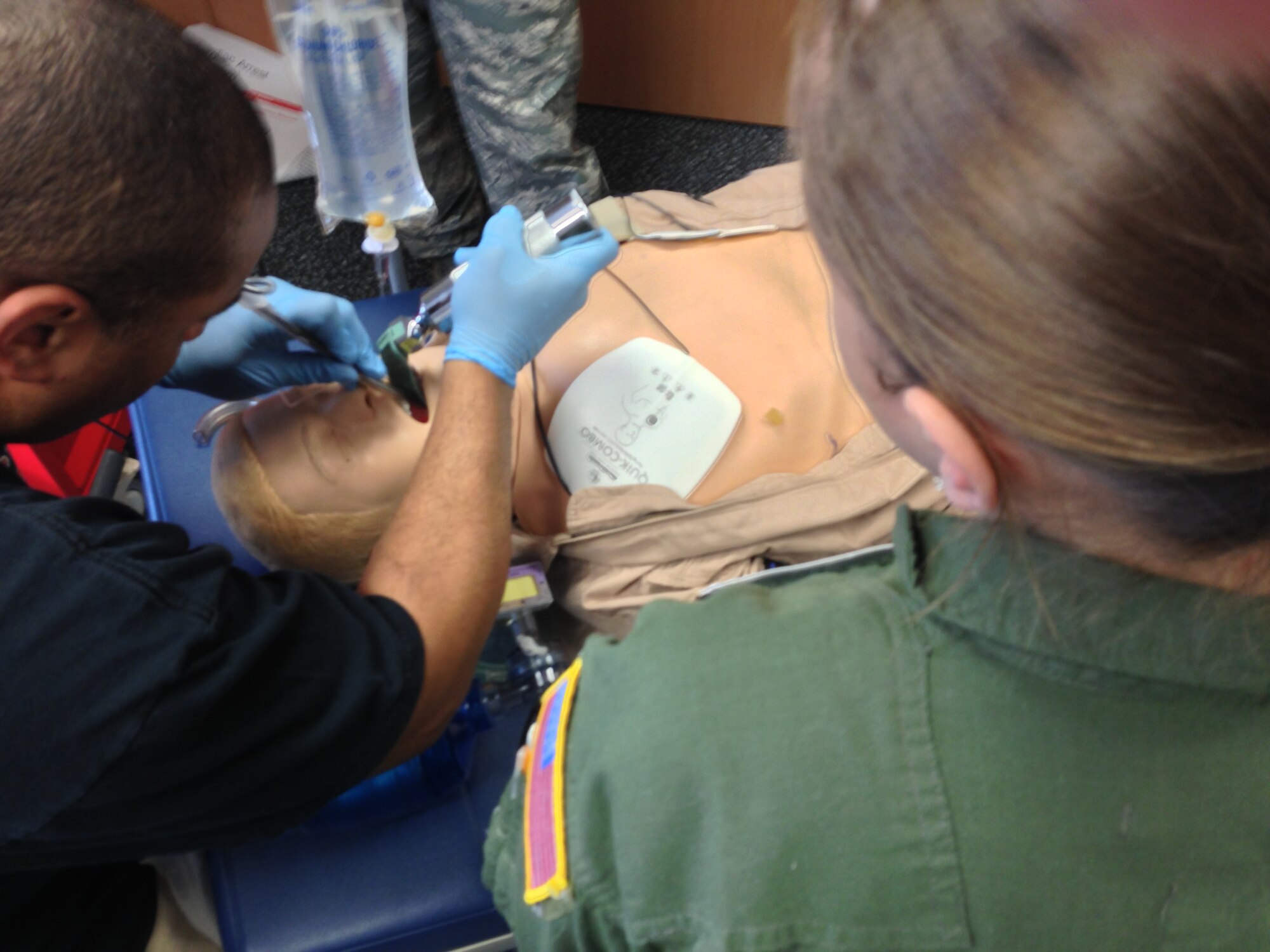Staff Sgt. Danika Fulham, 86th Aeromedical Evacuation Squadron medical technician, supervises the insert of a tracheal tube on a smart dummy during readiness skills verification training April 12, 2013 at Ramstein Air Base, Germany. The 86th AES is an aeromedical evacuation squadron that provides timely, efficient movement of patients and en route care. This type of evacuation has been used extensively throughout all major wars since World War II and saved countless lives. (U.S. Air Force photo/Staff Sgt. Travis Edwards)