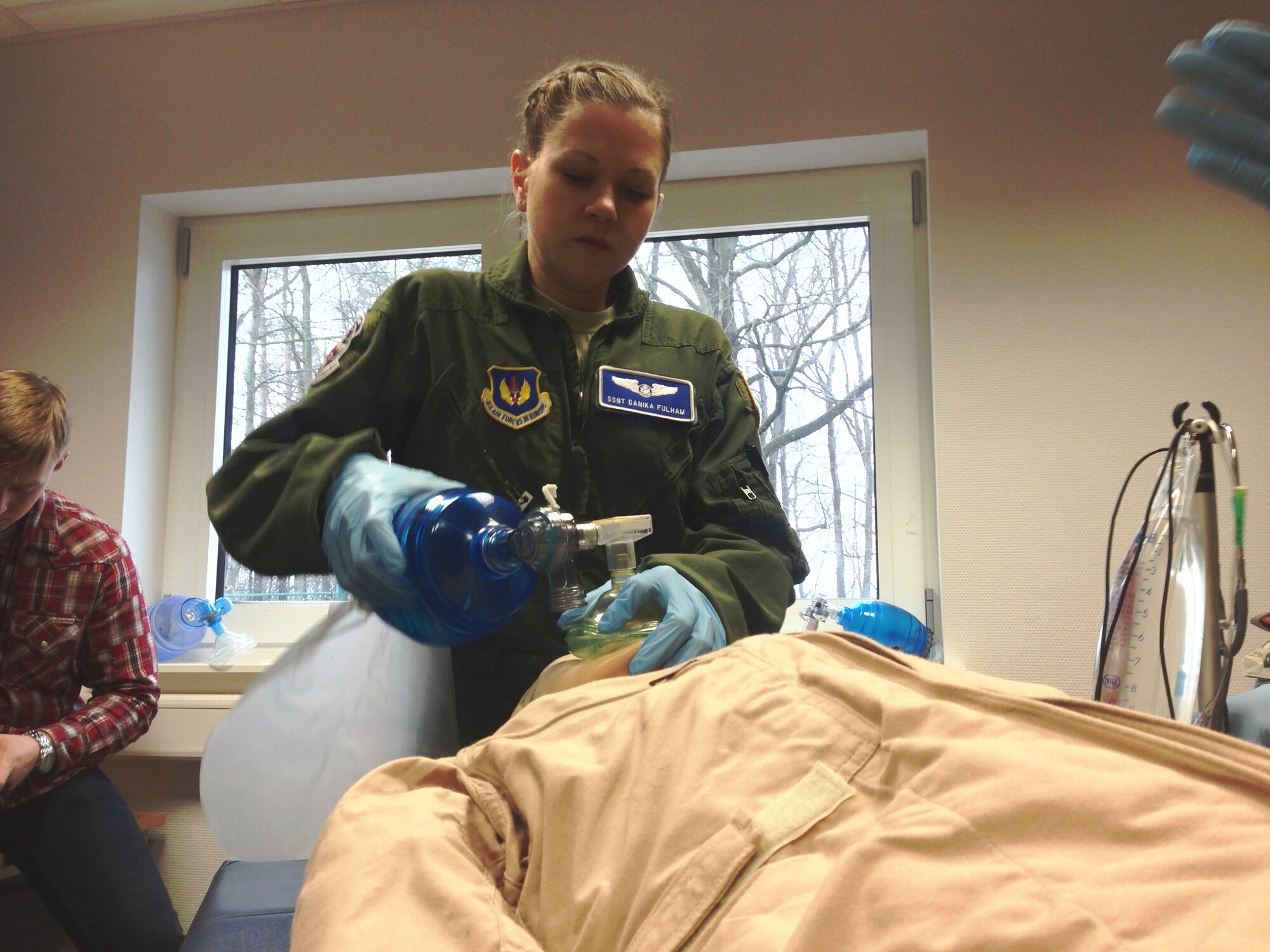 Staff Sgt. Danika Fulham, 86th Aeromedical Evacuation Squadron medical technician, administers a bag-valve mask to assist the breathing on a smart dummy during readiness skills verification training April 12, 2013 at Ramstein Air Base, Germany. The 86th AES is an aeromedical evacuation squadron that provides timely, efficient movement of patients and en route care. This type of evacuation has been used extensively throughout all major wars since World War II and saved countless lives. (U.S. Air Force photo/Staff Sgt. Travis Edwards)