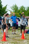 8th Fighter Wing Airmen sling water balloons towards numerically marked targets at Kunsan Air Base, Republic of Korea, June 8, 2013. The numbers on the buckets indicated the amount of ‘Korean delicacies’ the team members had to eat, which ranged from kimchi to preserved silkworm larvae. This was part of the Wolf Pack Warrior Mud Run, which had more than 100 participants including the wing and vice commanders. (U.S. Air Force photo by Staff Sgt. Jonathan Fowler/Released)