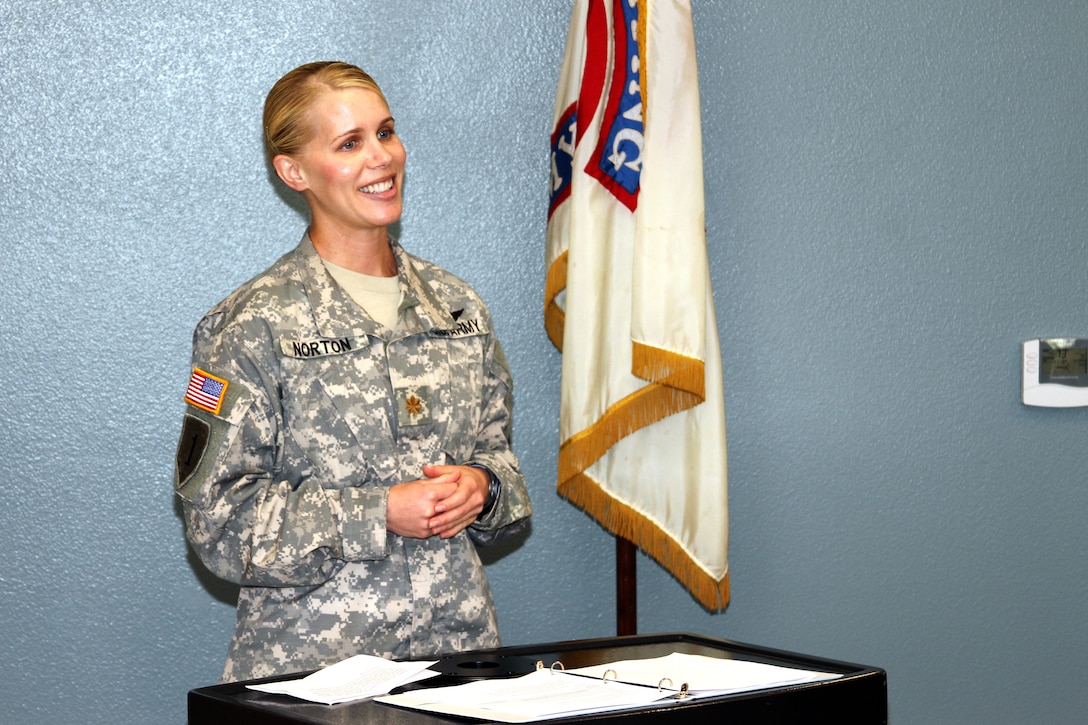 Army Maj. Emily Norton, commander of the Army's Newport Beach Recruiting Company, addresses guests during the grand opening of the Army's newest recruiting center in Mission Viejo, Calif., June 14.