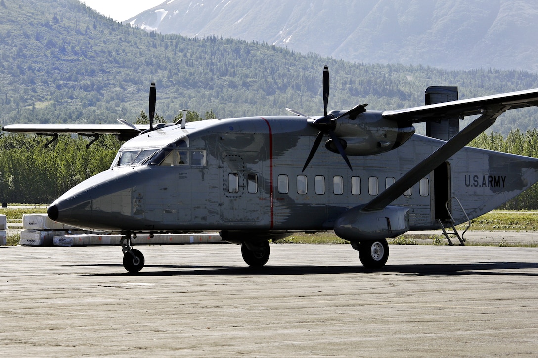 A C-23 Sherpa aircraft awaits take off from Bryant Army Airfield for airborne operations over Malamute Drop Zone on Joint Base Elmendorf-Richardson, Alaska, June 12, 2013. The pilots are assigned to Alaska Army National Guard's 1st Battalion, 207th Aviation Regiment.