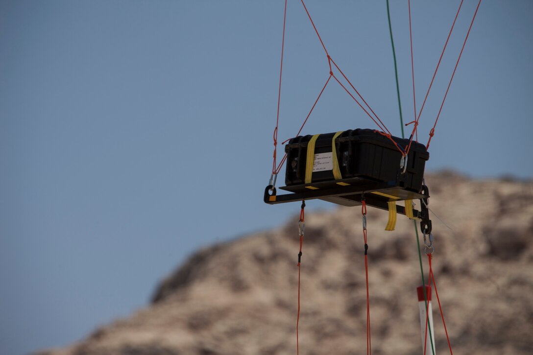 U.S. Marine Corps communications Marines assigned to 26th Marine Expeditionary Unit (MEU) test launch a tethered communications system during Exercise Eager Lion 2013 in Al Quweira, Jordan, June 12, 2013. Exercise Eager Lion 2013 is an annual, multinational exercise designed to strengthen military-to-military relationships and enhance security and stability in the region by responding to modern-day security scenarios. The 26th MEU is a Marine Air-Ground Task Force forward-deployed to the U.S. 5th Fleet area of responsibility aboard the Kearsarge Amphibious Ready Group serving as a sea-based, expeditionary crisis response force capable of conducting amphibious operations across the full range of military operations. (U.S. Marine Corps photo by Staff Sgt. Edward R. Guevara Jr./Released)