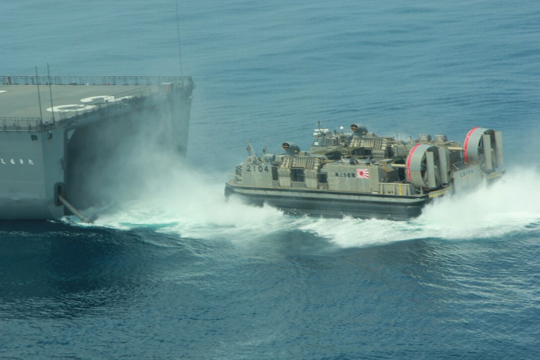 A Japanese Navy Landing Craft Air Cushion (LCAC) disembarks from JS Hyuga while conducting amphibious assault operations off the coast of San Clemente Island June 17, 2013.