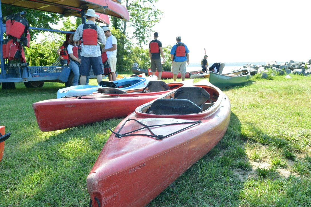 Kayaks and canoes are lined up pointing toward the Potomac River as residents aboard Marine Corps Base Quantico await their turn to go into the water during the Town Of Quantico’s Father’s Day Flotilla event June 15. 2013.