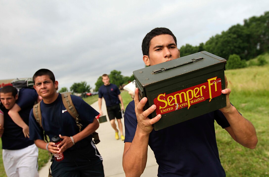 Poolees from Recruiting Substations Independence and Overland Park conduct physical training at RSS Independence, June 15. Recruiters gather pooles regularly and conduct physical training to prepare them for the challenges of recruit training.