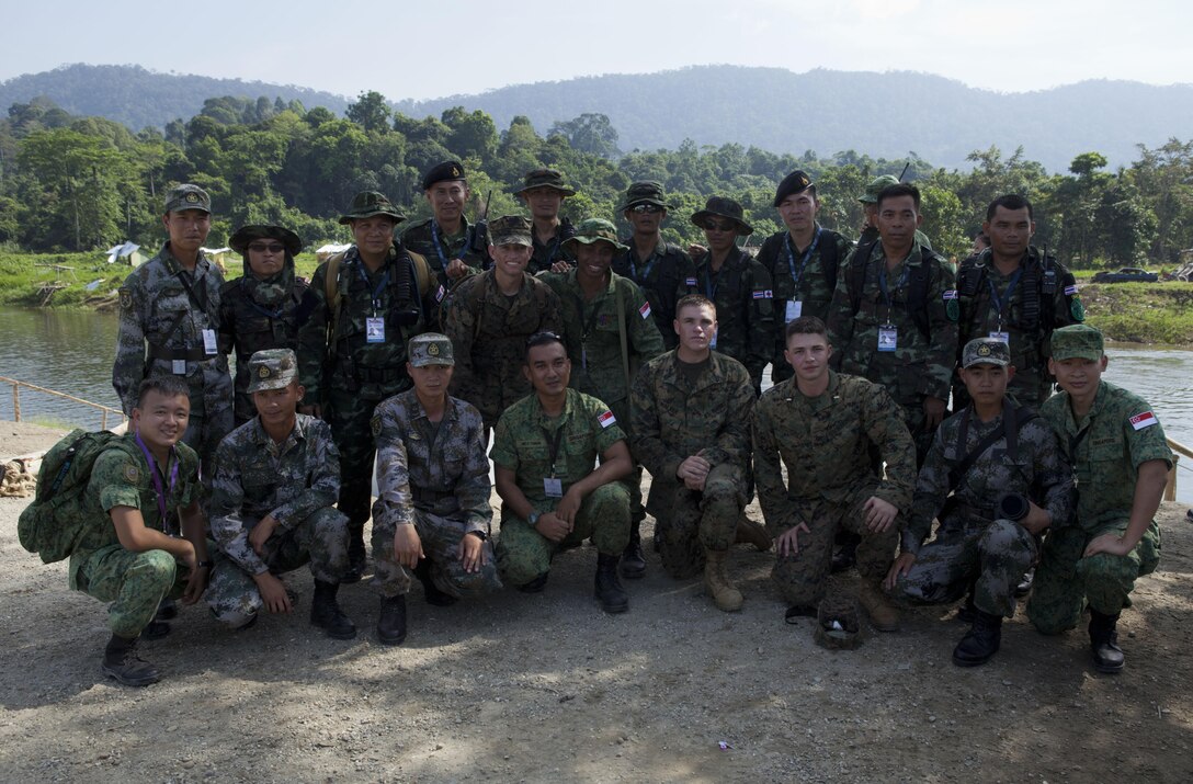 Representatives from multiple Asia-Pacific nations gather for a multinational group photo during the ASEAN Humanitarian Assistance/Disaster Relief and Military Medicine Exercise hosted by Brunei Darussalam June 17 in Temburong, Brunei. More than 2,500 multinational personnel from 18 Asia-Pacific nations are participating in the ASEAN exercise, which provides a platform for regional partner nations to address shared security challenges, strengthen defense cooperation, enhance interoperability and promote stability in the region. ASEAN is comprised of Brunei, Cambodia, Indonesia, Laos, Malaysia, Myanmar (Burma), Philippines, Singapore, Thailand and Vietnam. Non-ASEAN countries include Australia, China, India, Japan, New Zealand, Republic of Korea, Russia and the U.S. The exercise is scheduled from June 17 to 20.