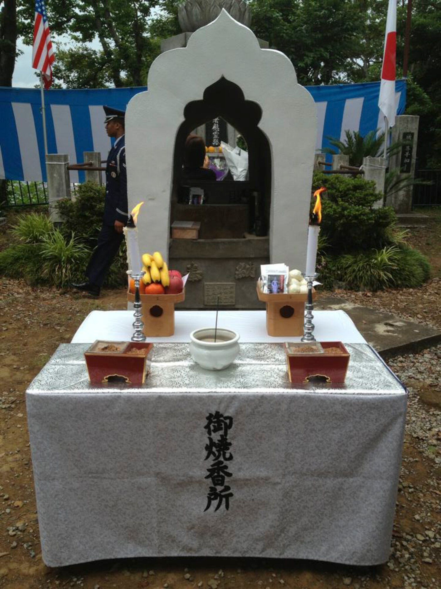 A table with incense is displayed for the B-29 ceremony attendees to pay their respect at Shizuoka, Japan, June 15, 2013. The attendees hiked up to the summit of Sengen Hill to get to the memorial ceremony. (U.S. Air Force photo by Tech. Sgt. Davy Huffman)