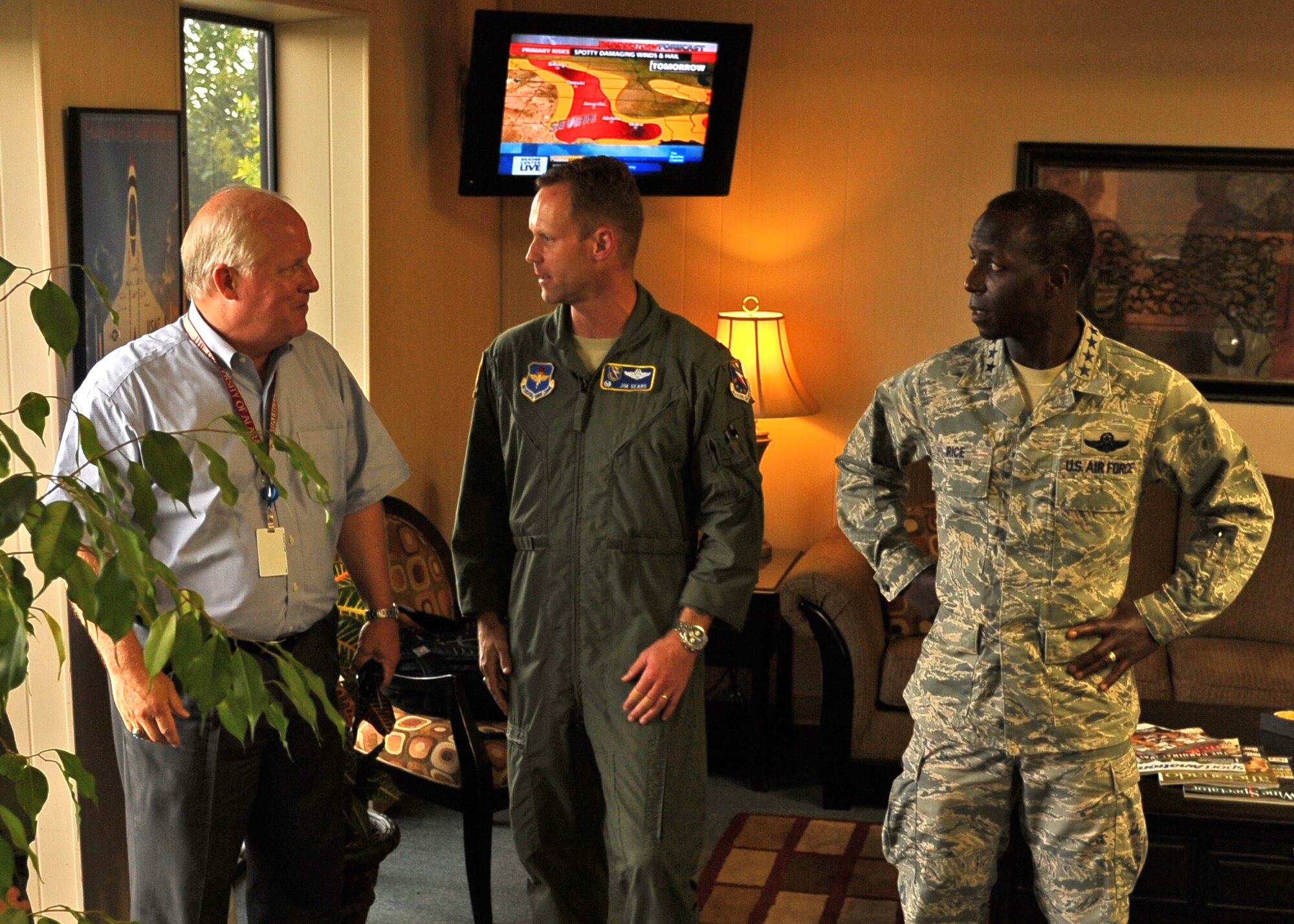 Col. Jim Sears, 14th Flying Training Wing Commander thanks Golden Triangle Regional Airport Director Mike Hainsey for providing a short-notice tour to the Air Education and Training Commander, Gen. Edward Rice, his wife Teresa and the AETC Command Chief, Chief Master Sgt. Gerardo Tapia after their Columbus Air Force Base, Miss. bound aircraft diverted into the airport due to bad weather at the base. Columbus AFB currently has 12 T-1 Jayhawk trainers operating out of the Golden Triangle airport while the base's center runway is closed for construction.  (U.S. Air Force Photo/Airman 1st Class Charles Dickens)
