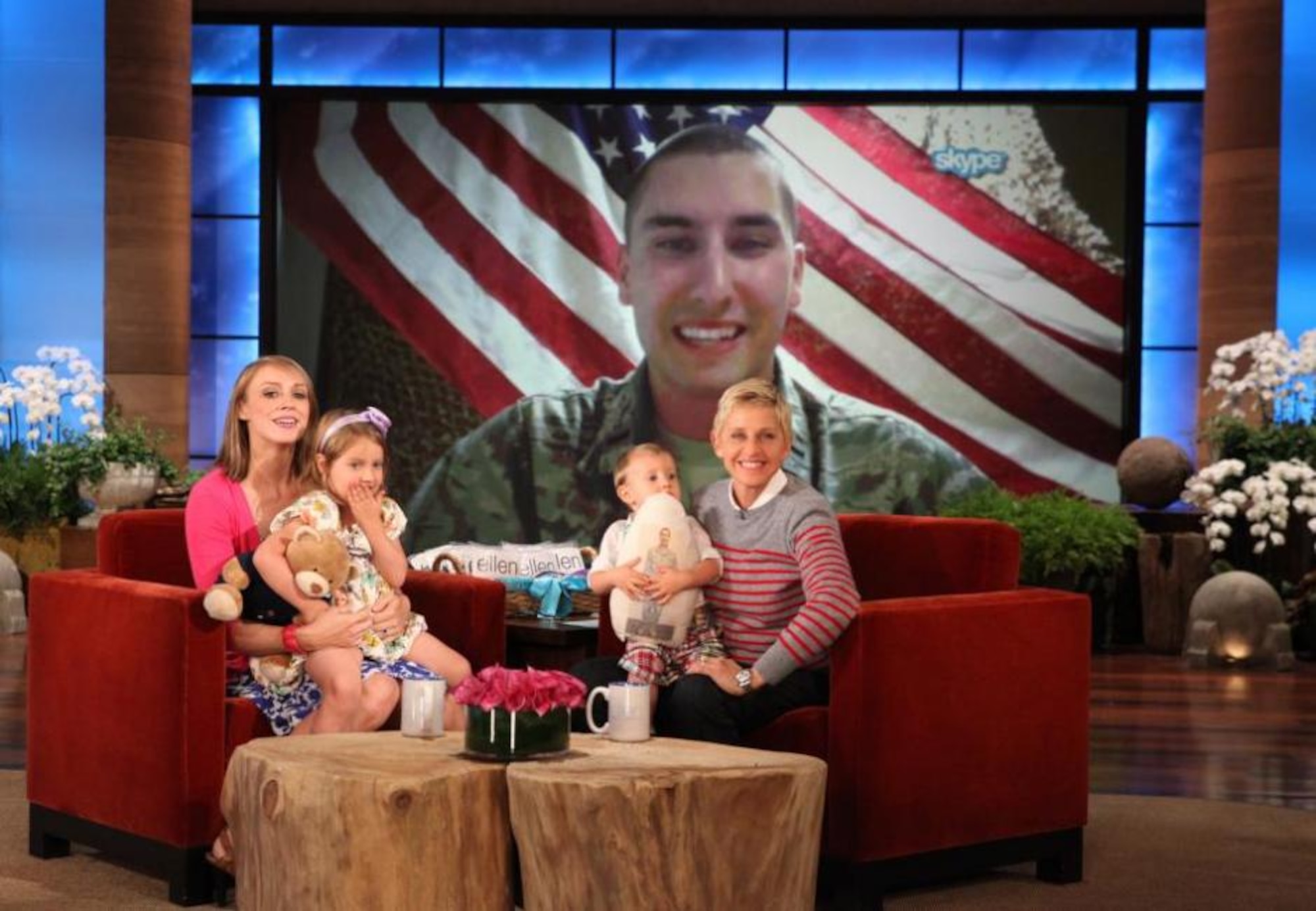 Vania Ferreira, Air Force military spouse, and her children chat with Ellen DeGeneres during a taping of the television show on May 20. Vania's husband, 1st Lt. Rob Ferreira, is shown via Skype, as they talk with him at a remote location in Southwest Asia. (Courtesy photo)