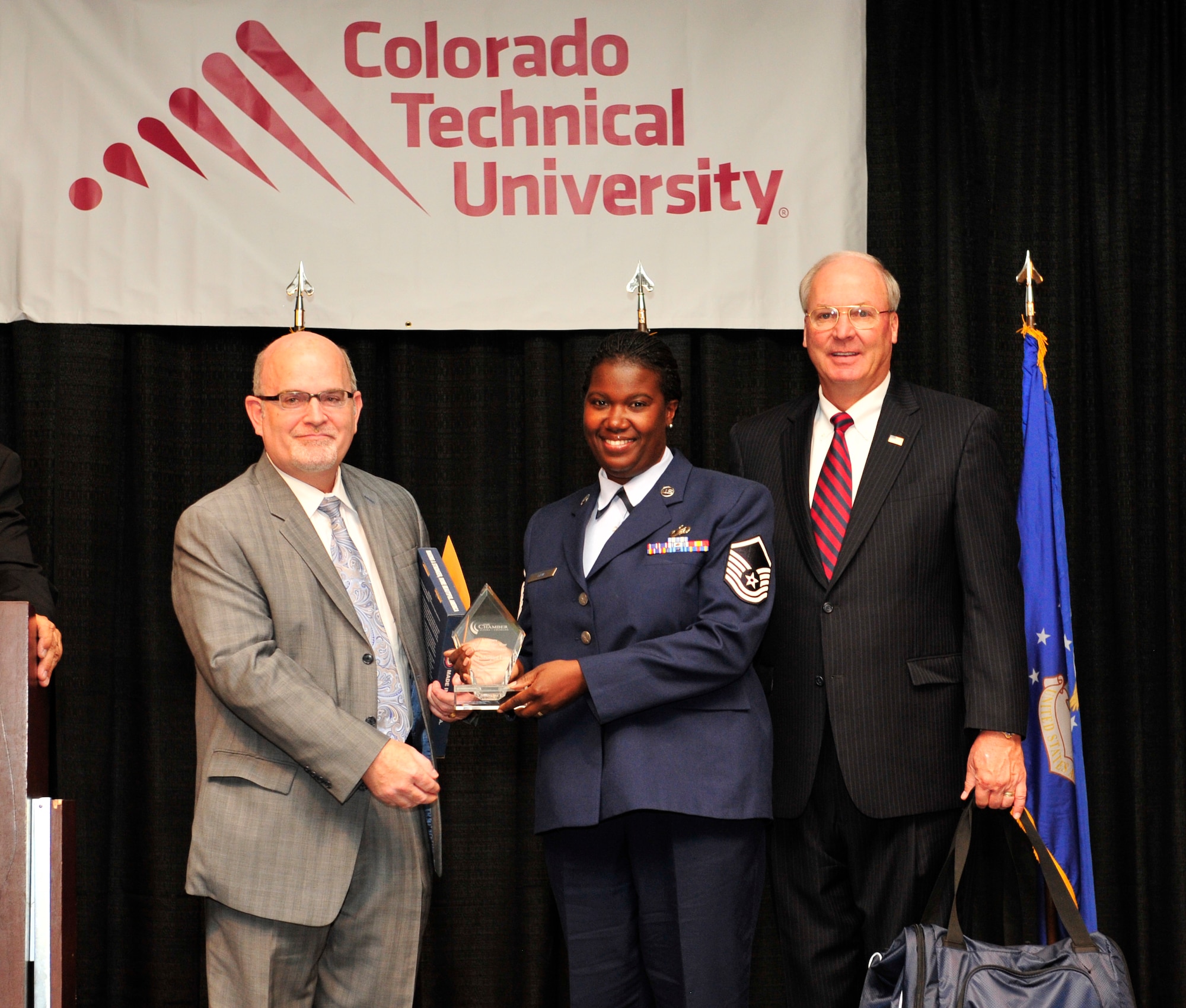 Aurora Chamber of Commerce officials honored men and women of the armed forces during the 37th Annual Armed Forces Recognition Luncheon here June 14. Sponsored by Colorado Technical University, the luncheon included an awards ceremony for Military Persons of the Year to individuals who were selected by their service branches for their outstanding achievements during the past year. Master Sgt. Murjani Law, senior manager for the Readiness Management Group Detachment 29, Air Reserve Personnel Center, won in the Air Force Reserve category. (U.S. Air Force photo/Airman 1st Class Darryl Bolden, Jr.)


