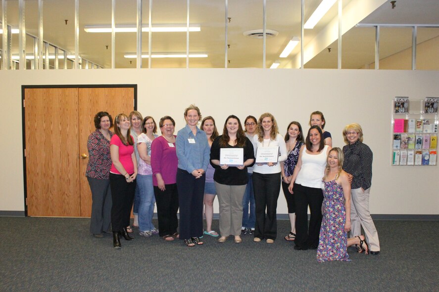 MINOT AIR FORCE BASE, N.D. -- With financial support from Northrop Grumman Corp., the Minot Enlisted Spouses' Club, recently awarded two enlisted spousal scholarships for the 2013-14 School Year. Recipients: Lauren Misciagna and Carly Neale Each, each were awarded in the amount of $1000. Lauren Misciagna will continue her pursuit of an Associate's Degree in Nursing at Williston State College this Fall, and Carly Neale, currently enrolled in Elementary Education at Minot State University, will continue her academic studies there this Fall. The MESC wishes to extend its congratulations to both enlisted spouses on earning these awards. (Courtesy photo)