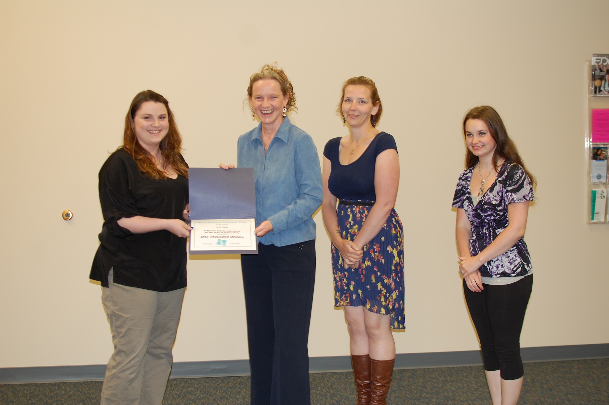 MINOT AIR FORCE BASE, N.D. -- With financial support from Northrop Grumman Corp., the Minot Enlisted Spouses' Club, recently awarded two enlisted spousal scholarships for the 2013-14 School Year. Recipients: Lauren Misciagna and Carly Neale Each, each were awarded in the amount of $1000. Lauren Misciagna will continue her pursuit of an Associate's Degree in Nursing at Williston State College this Fall, and Carly Neale, currently enrolled in Elementary Education at Minot State University, will continue her academic studies there this Fall. The MESC wishes to extend its congratulations to both enlisted spouses on earning these awards. (Courtesy photo)