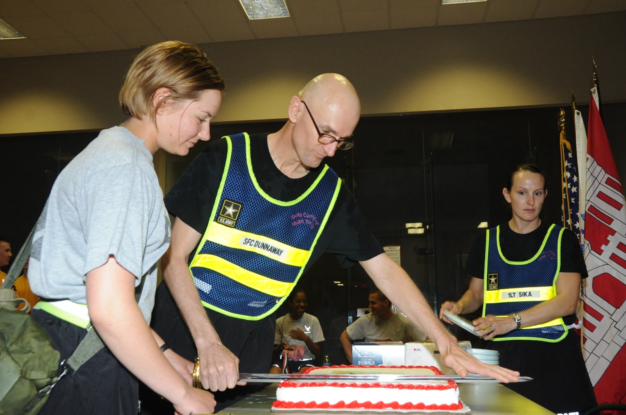 The U.S. Army celebrated it's 238th birthday by running a 5k June 15 on Sheppard. A ceremonial sword was used to cut a celebratory cake in the Levitow Fitness Center after the run. (U.S. Air Force photo by Airman 1st Class Jelani Gibson) 