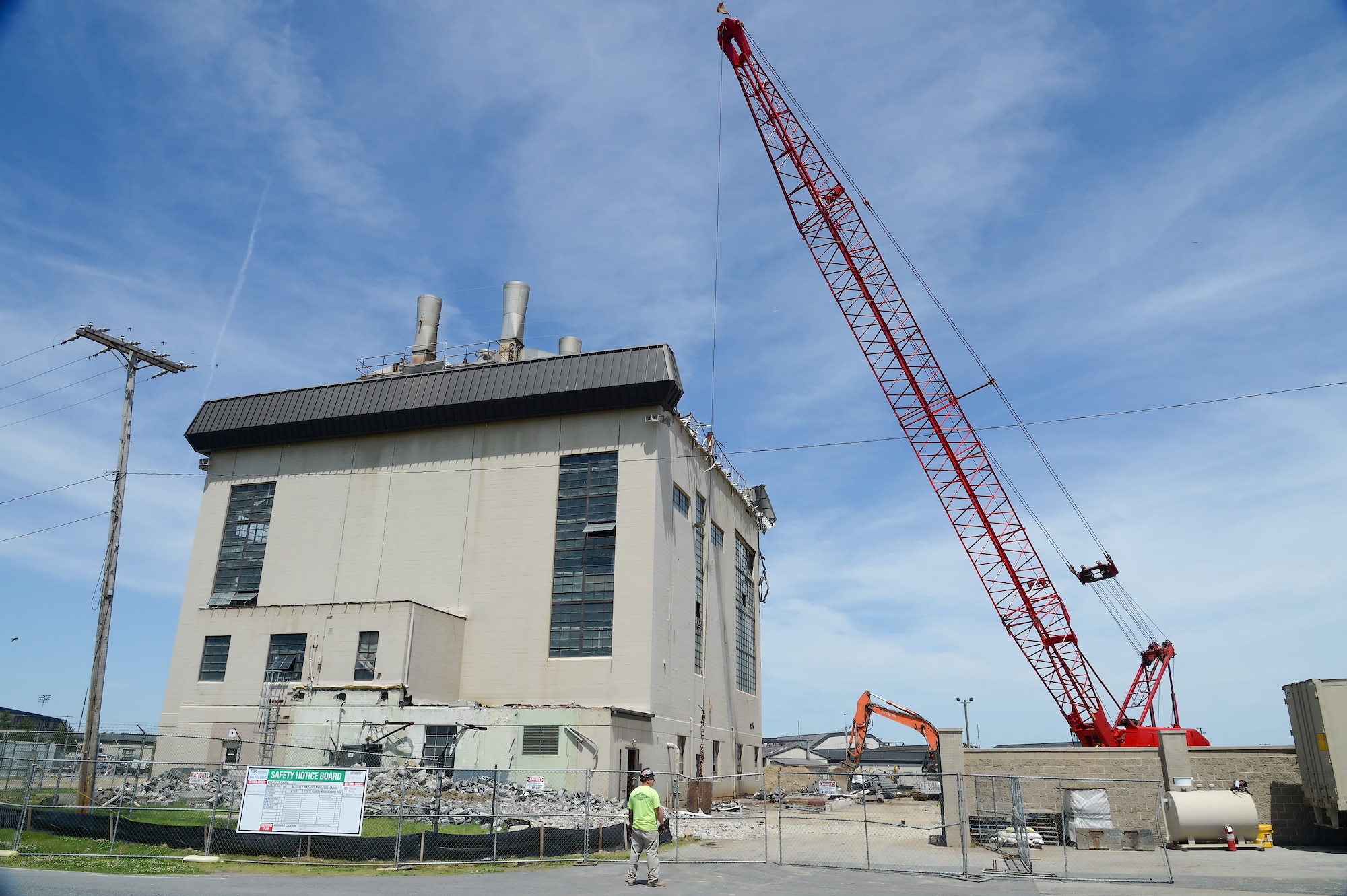 The demolition process is set to begin at Building 617 with the removal of the upper skirting June 5, 2013, at Dover Air Force Base, Del. The plant was replaced with a natural gas heating system that provides hot water and heat for the base. (U.S. Air Force photo/Greg L. Davis)
