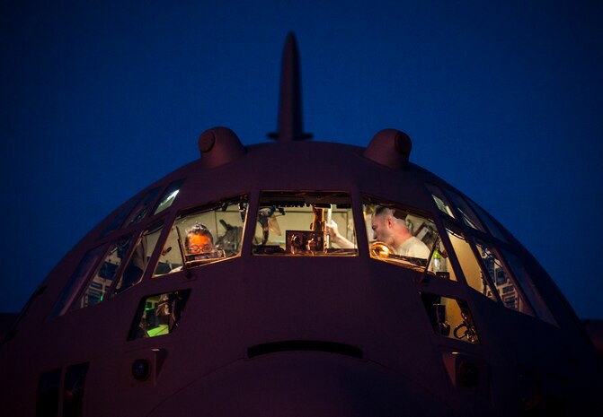 The 910th Airlift Wing aircrew, Youngstown Air Reserve Station, Ohio, perform post-flight operations after conducting aerial spraying of mosquitos June 15, 2103, at the Joint Base Charleston – Air Base S.C. The spray crew is the only one of its kind in the Air Force, assisting multiple bases year-round with their specific area of expertise. Spraying for mosquitos was conducted over the JB Charleston – Weapons Station. (U.S. Air Force photo/Senior Airman Dennis Sloan)