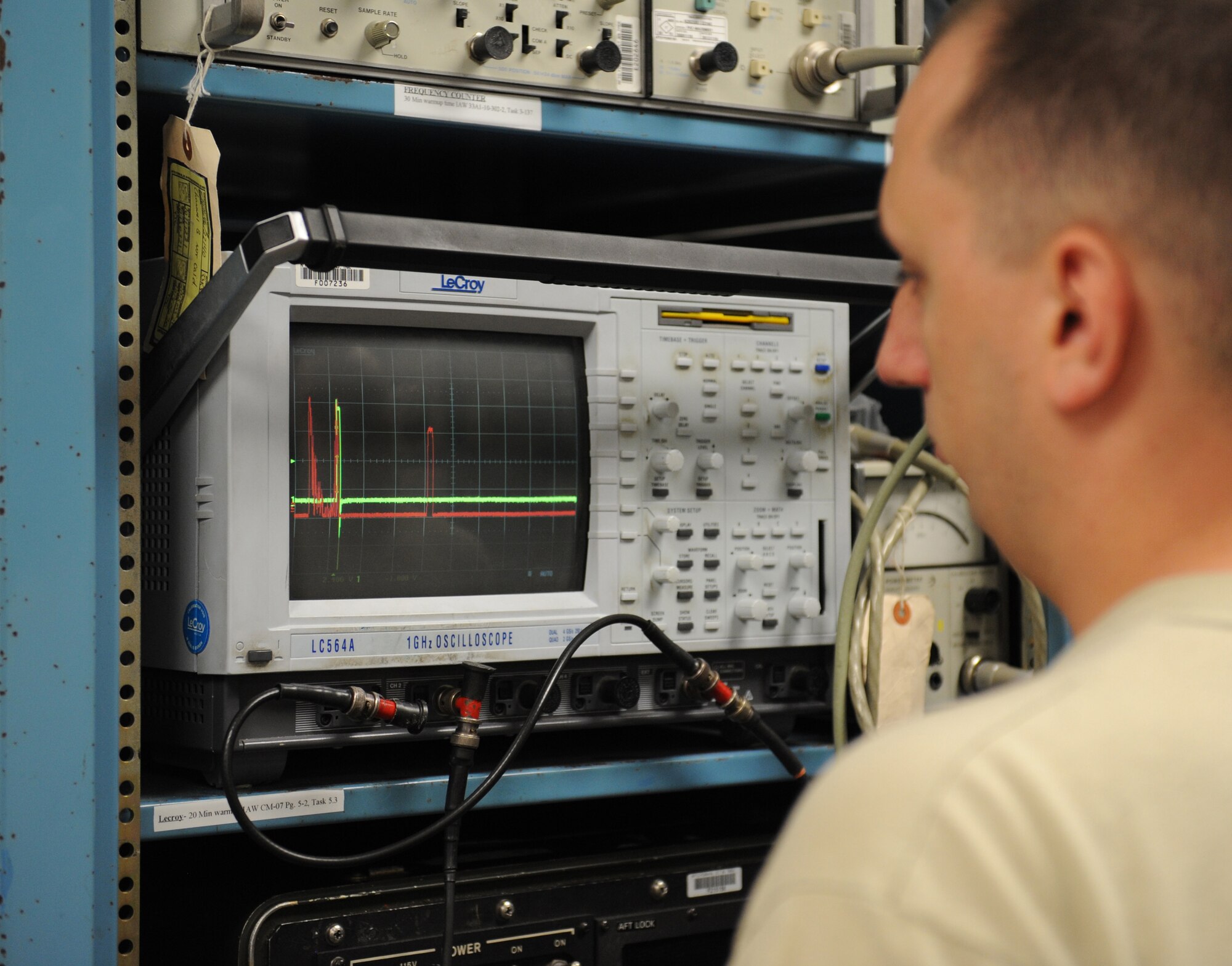 Senior Airman Paul Balough, 2nd Maintenance Squadron communication navigation mission systems journeyman, reads an oscilloscope on Barksdale Air Force Base, La., June 18, 2013. Airmen in the avionics section maintain the radar systems used on B-52H Stratofortress bombers. (U.S. Air Force photo/Airman 1st Class Benjamin Gonsier)

