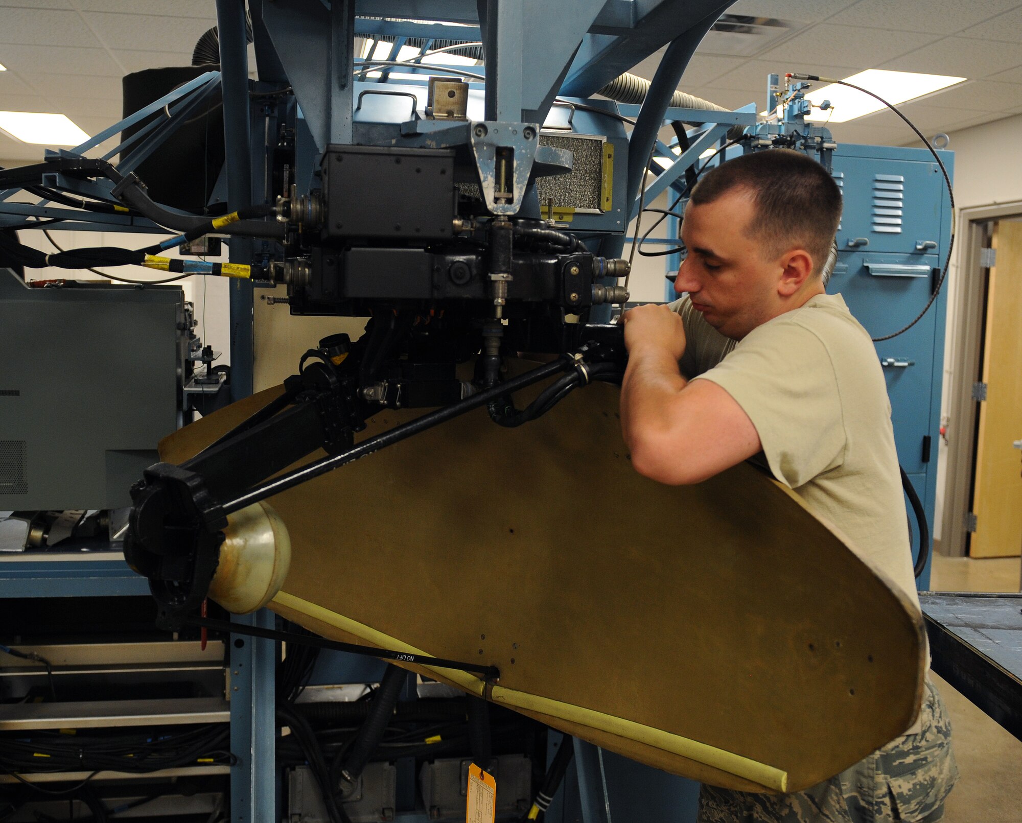Senior Airman Paul Balough, 2nd Maintenance Squadron communication navigation mission systems journeyman, conducts an alignment check on a strategic radar system on Barksdale Air Force Base, La., June 18, 2013. The radar system was connected to a radar test set, which is used to troubleshoot antenna and other radar components. (U.S. Air Force photo/Airman 1st Class Benjamin Gonsier)
