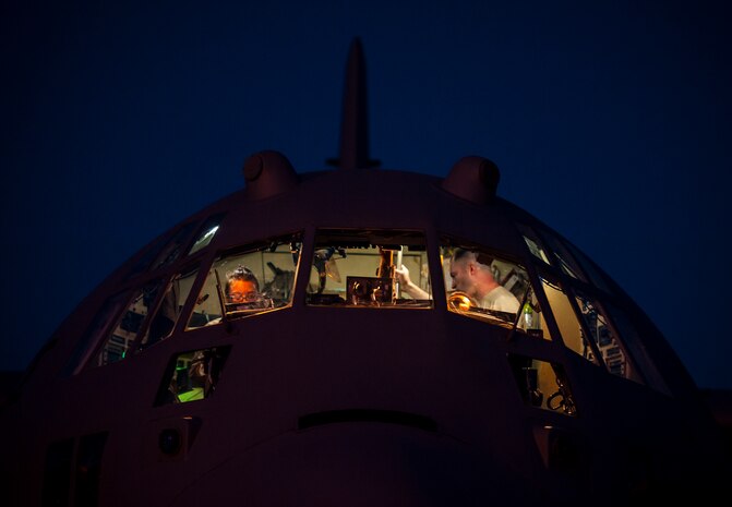 The 910th Airlift Wing aircrew, Youngstown Air Reserve Station, Ohio, perform post-flight operations after conducting aerial spraying of mosquitos June 15, 2103, at the Joint Base Charleston – Air Base S.C. The spray crew is the only one of its kind in the Air Force, assisting multiple bases year-round with their specific area of expertise. Spraying for mosquitos was conducted over the JB Charleston – Weapons Station. (U.S. Air Force photo/Senior Airman Dennis Sloan)
