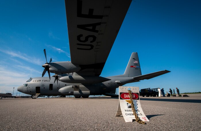 An Air Force Reserve aircrew flying a C-130 Hercules assigned to the 910th Airlift Wing, Youngstown Air Reserve Station, Ohio, prepares for aerial spraying of mosquitos June 15, 2013, at Joint Base Charleston – Air Base,  S.C. Spraying for mosquitos was conducted over the JB Charleston – Weapons Station. The spray crew is the only one of its kind in the Air Force, assisting multiple bases year-round with their specific area of expertise. (U.S. Air Force photo/Senior Airman Dennis Sloan)