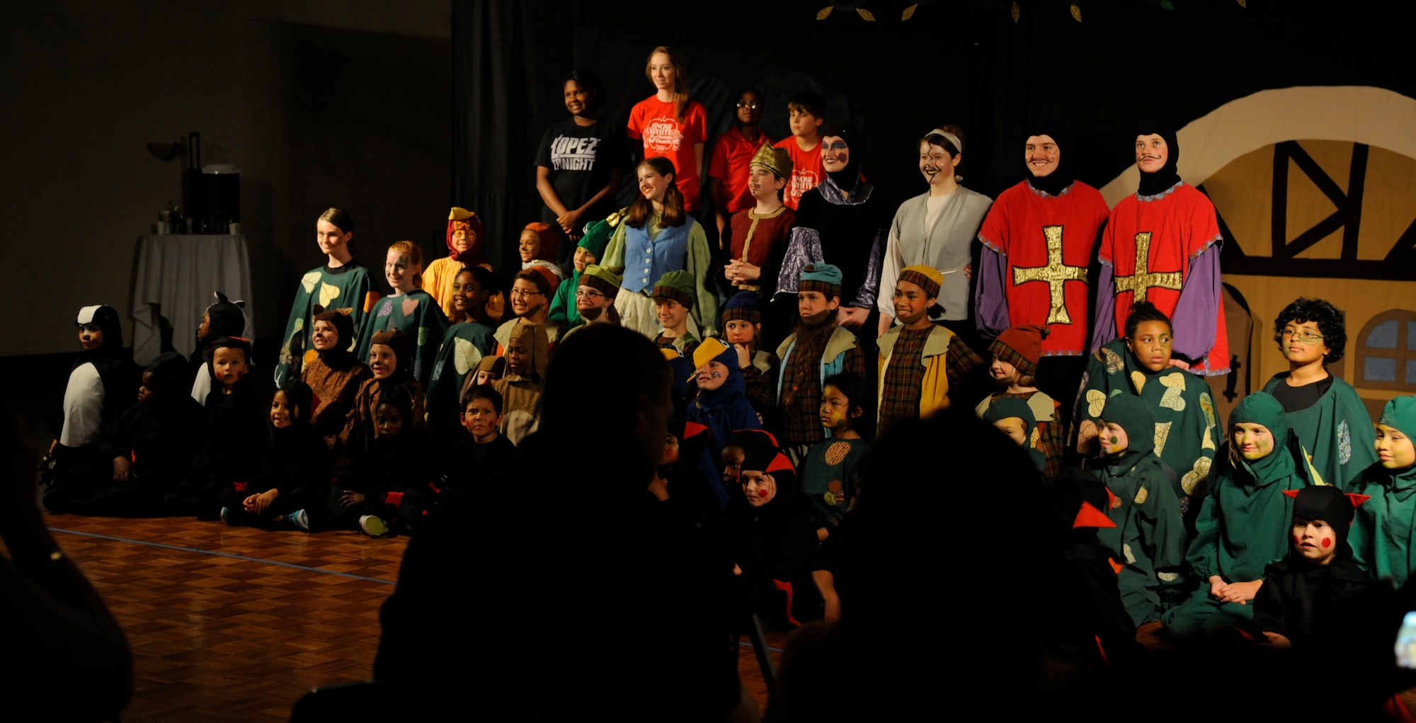 The cast of "Snow White" poses for photos on Barksdale Air Force Base, La., June 14, 2013. The Missoula Children's Theatre held auditions at the Child Development Center on Barksdale as an opportunity to introduce children to the performing arts. (U.S. Air Force photo/Airman 1st Class Andrew Moua)