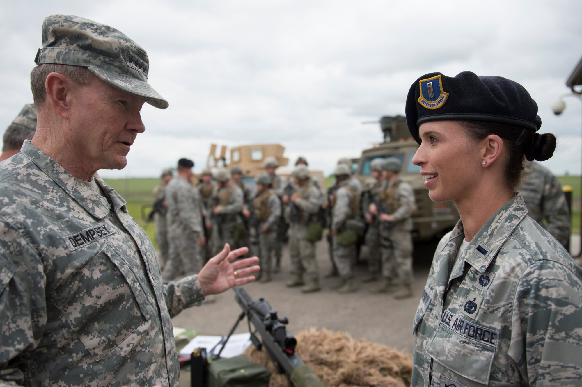 Gen. Martin E. Dempsey, chairman of the Joint Chiefs of Staff, talks with Air Force Security Forces at Minot AFB, ND, Jun 17, 2013.  Dempsey visited Minot to observe the Air Force Nuclear Triad operations and visit with the Airmen.  DOD Photo by D. Myles Cullen