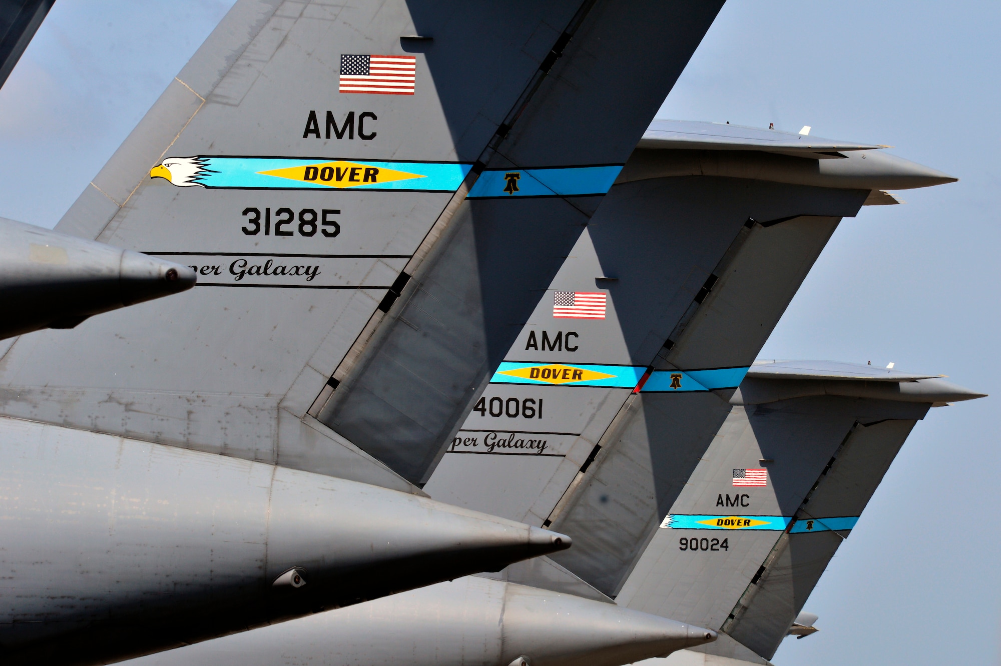 436th Airlift Wing C-5M Super Galaxy aircraft line the flight line as they await airlift missions at Dover Air Force Base, Del. in support of worldwide military operations. The 436th Aerial Port Squadron operates the largest and busiest air freight terminal in the Department of Defense.  (U.S. Air Force photo/David S. Tucker)