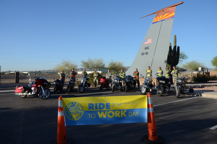 Airmen of the 161st Air Refueling Wing motorcycle club participate in the Annual Ride-to-Work day at Sky Harbor International Airport, June 18th, 2013. “Ride Smart” is part of the “Critical Days of Summer” safety campaign designed to ensure all Airmen have zero preventable fatal mishaps and an injury-free summer. (U.S. Air National Guard photo by Senior Airman Rashaunda Williams/Released)