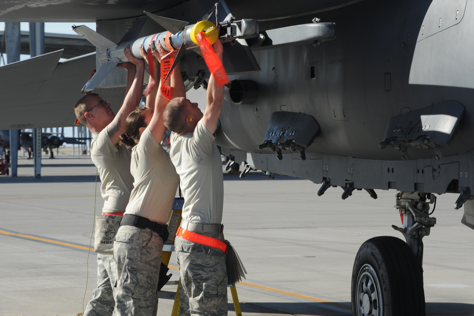 Airmen participate in a load competition during the Gunfighter Challenge June 12, 2013, at Mountain Home Air Force Base, Idaho. Airmen were challenged by how well they accomplished tasks in a set amount of time. (U.S. Air Force Photo by Airman 1st Class Malissa Lott/Released)