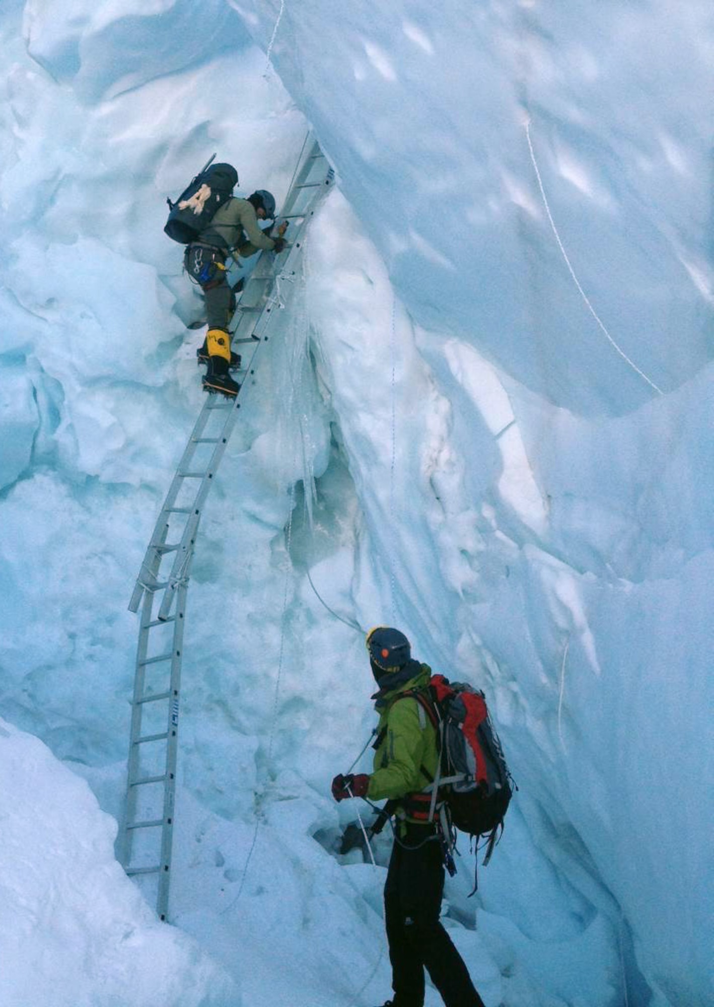 The Air Force Seven Summits Team moves through the Khumbu Icefall, a risky stretch of the Everest climb where large crevasses can open unexpectedly. Members of the team reached the top of the world's tallest mountain in May 2013. (U.S. Air Force photo)