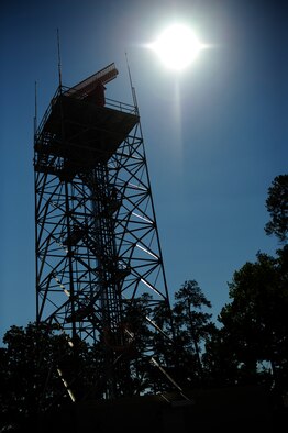 Staff Sgt. Nathan Coley, 20th Communications Squadron ground radar systems supervisor, ascends the Digital Airport Surveillance Radar tower to perform regular system checks and maintenance at Shaw Air Force Base, S.C., June 14, 2013. Coley helps maintain and repair radar surveillance equipment at Shaw so those on the ground can have eyes in the sky. (U.S. Air Force photo by Airman 1st Class Daniel Blackwell/Released)