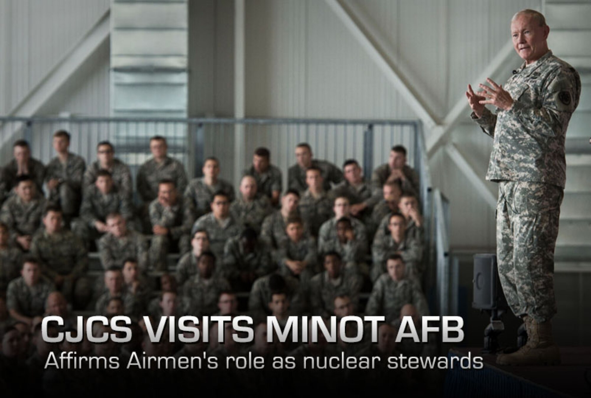 Army Gen. Martin E. Dempsey addresses Airmen during a town hall meeting June 17, 2013, on Minot Air Force Base, N.D. The Airmen are members of the 5th Bomb Wing and 91st Missile Wing. Dempsey is the chairman of the Joint Chiefs of Staff. (DOD photo/D. Myles Cullen)